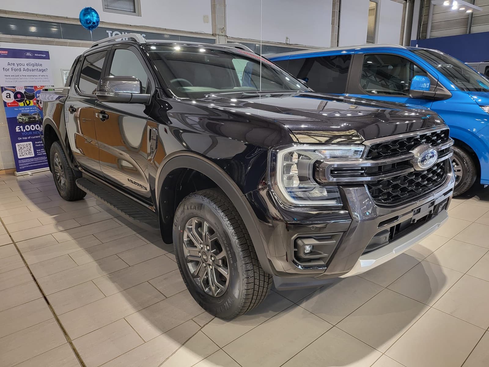 Black pickup truck for sale, front three-quarter view