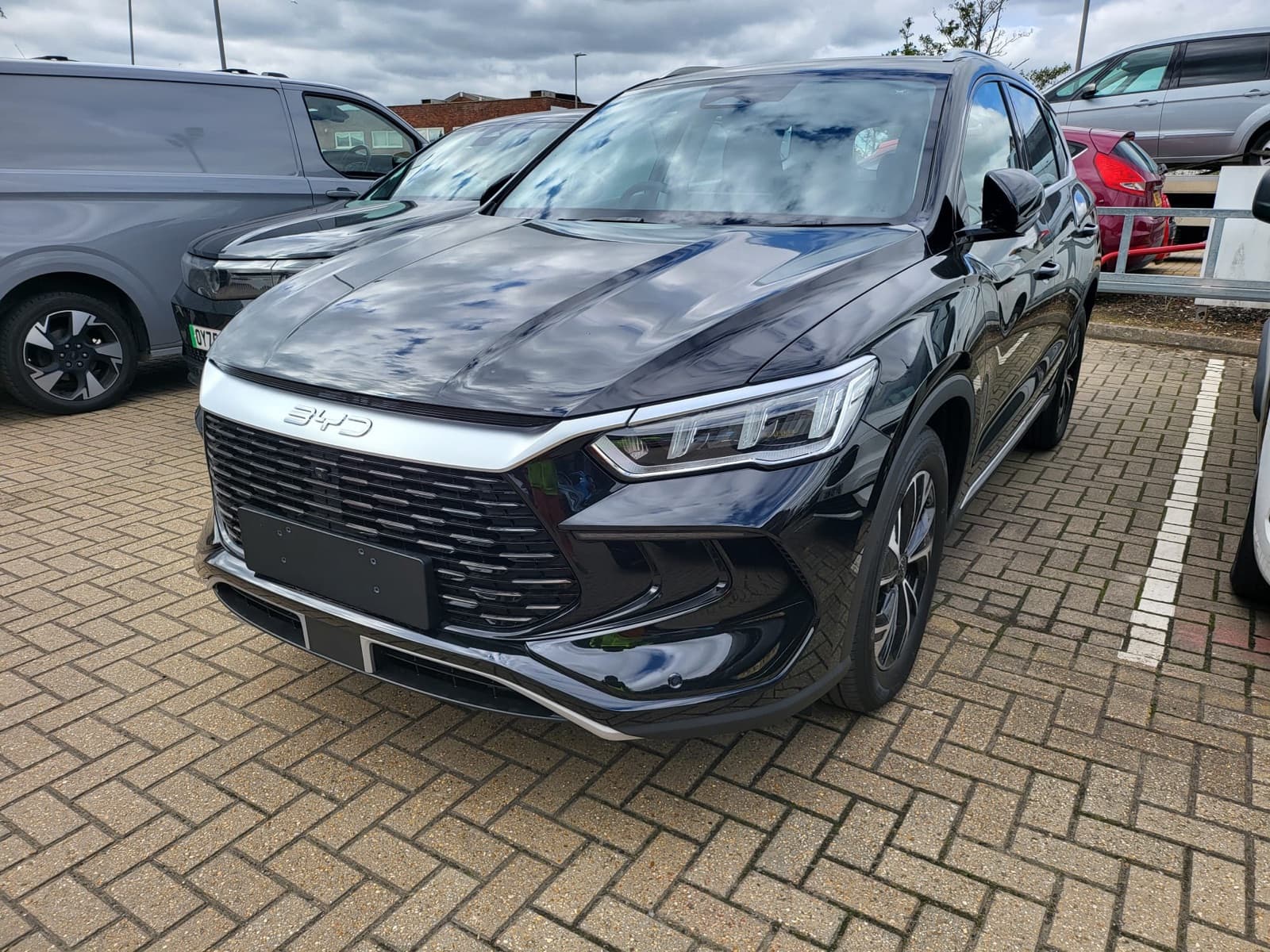 Black SUV, front three-quarter view